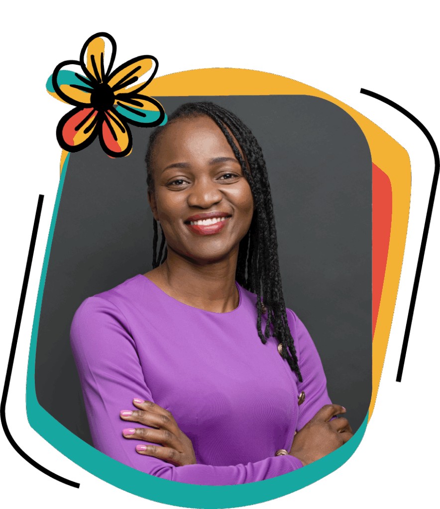 Aggie is a dark-skinned woman with long hair, smiling and wearing a purple top.