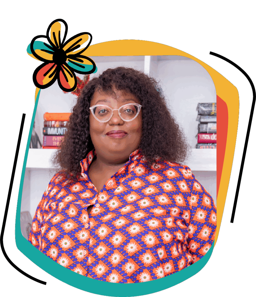 Elizabeth Maina is a brown-skinned woman with long curly hair, and she is wearing cool clear glasses and a funky-colored top.